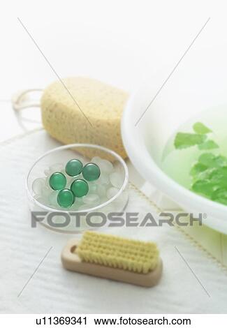 Bowl with herbs and toiletries View Large Photo Image Stock Image - Bowl with herbs and toiletries. Fotosearch