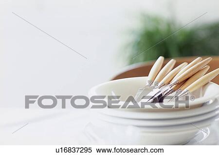Bowls and cutlery on a countertop View Large Photo Image Stock Photography - Bowls and cutlery on a countertop. Fotosearch