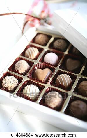 Picture - Box of chocolates, white background. Fotosearch