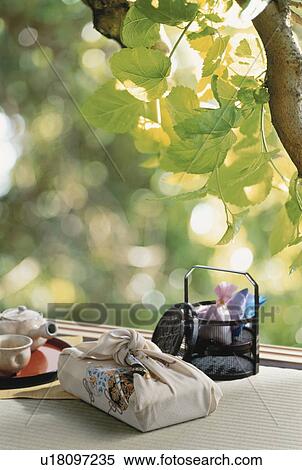 Stock Photography - Boxed lunch, bento wrapped in furoshiki. Fotosearch