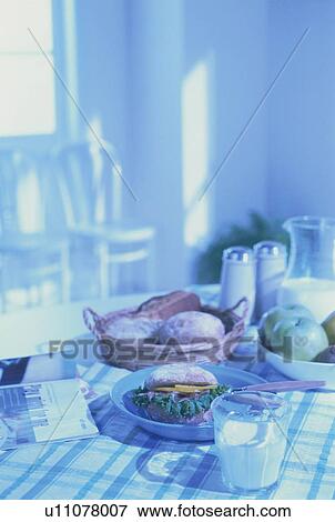 Stock Photo - Breakfast laid out in the kitchen. Fotosearch