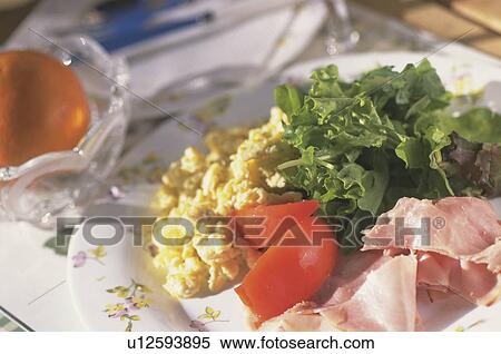 Breakfast of salad, ham and scrambled eggs View Large Photo Image Stock Photography - Breakfast of salad, ham and scrambled eggs. Fotosearch