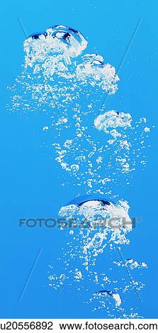 Stock Image - Bubbles underwater. Fotosearch