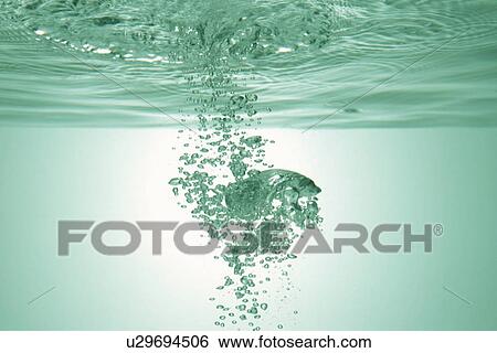 Bubbles underwater View Large Photo Image Stock Photograph - Bubbles underwater. Fotosearch