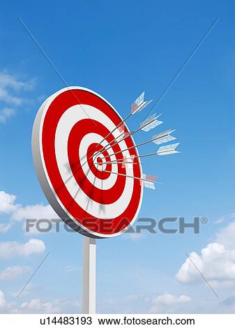 Stock Image - Bull's eye with sky in the background. Fotosearch