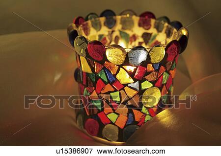 Burning aromatherapy candle in glass View Large Photo Image Stock Photo - Burning aromatherapy candle in glass. Fotosearch