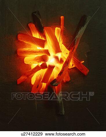 Stock Photo - Burning charcoal . Fotosearch