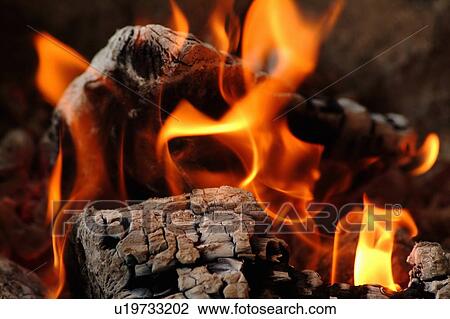 Stock Image - Burning Firewood. Fotosearch