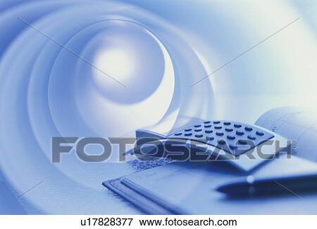 Stock Photo - Business essentials, a calculator and diary - digital composite. Fotosearch