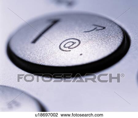 Stock Image - Button of mobile phone, close up. Fotosearch