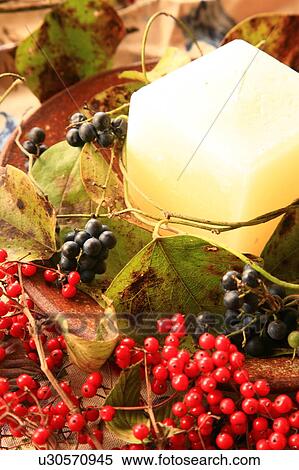 Candle with berries View Large Photo Image Stock Photography - Candle with berries. Fotosearch