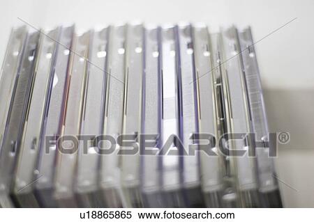 Stock Photography - Cases of compact disc, close up, white background. Fotosearch
