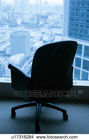 Picture - Chair beside window. Fotosearch