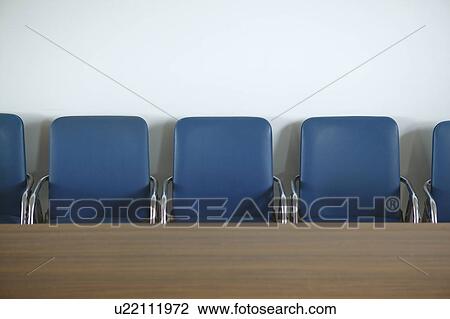 Chairs placed in line View Large Photo Image Stock Image - Chairs placed in line. Fotosearch
