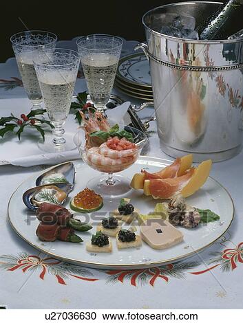 Stock Image - Champagne and Hors D'oeuvre. Fotosearch