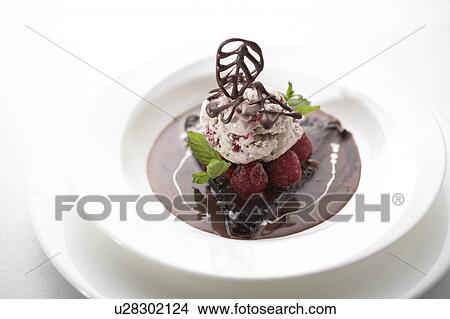 Picture - Chocolate crepes with ice cream and berries. Fotosearch