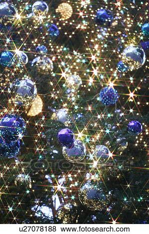 Stock Photo - Christmas tree with blue and silver baubles. Fotosearch