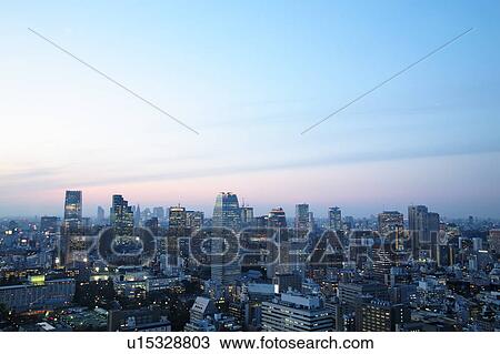 Stock Image - Cityscape in the evening, Tokyo prefecture, Japan. Fotosearch