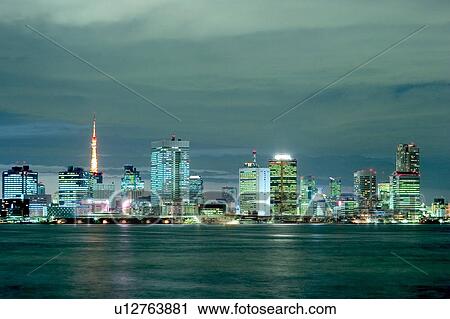 Stock Image - Cityscape in the night, long exposure, Tokyo prefecture, Japan. Fotosearch