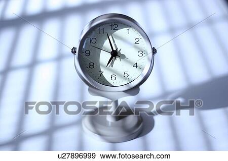 Stock Photo - Clock, white background. Fotosearch
