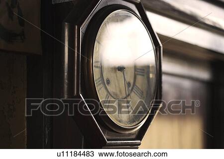 Stock Image - Close-up of Grandfather clock. Fotosearch
