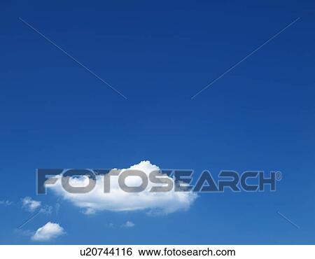 Stock Photograph - Clouds in blue sky, copy space, Minamiboso city, Chiba prefecture, Japan. Fotosearch