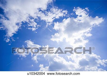 Picture - Clouds in blue sky. Fotosearch