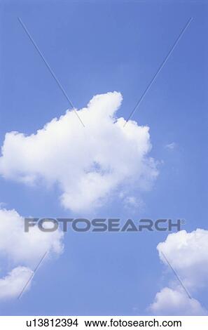Clouds in blue sky View Large Photo Image Picture - Clouds in blue sky. Fotosearch