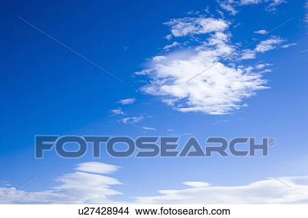 Clouds in blue sky View Large Photo Image Picture - Clouds in blue sky. Fotosearch