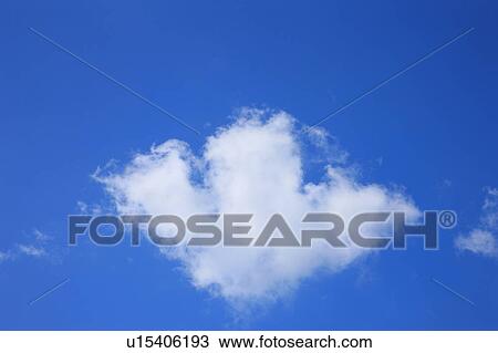 Stock Image - Clouds in blue sky. Fotosearch