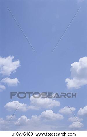 Clouds in blue sky View Large Photo Image Stock Photo - Clouds in blue sky. Fotosearch