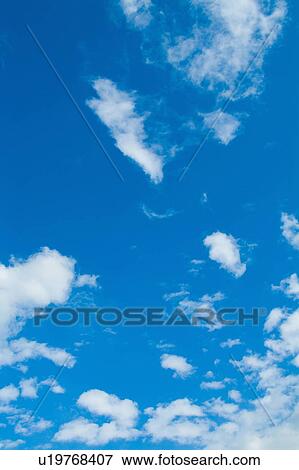 Clouds in blue sky View Large Photo Image Stock Photo - Clouds in blue sky. Fotosearch