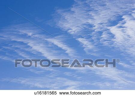 Stock Photography - Clouds in blue sky. Fotosearch