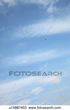 Stock Image - Clouds in blue sky, Tokyo prefecture, Japan. Fotosearch
