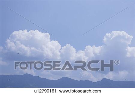 Clouds over mountain range, Aso, Kumamoto Prefecture, Japan View Large Photo Image Stock Image - Clouds over mountain range, Aso, Kumamoto Prefecture, Japan. Fotosearch