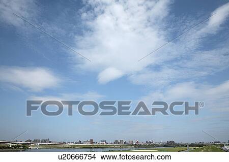 Clouds over office buildings, Tokyo prefecture, Japan View Large Photo Image Picture - Clouds over office buildings, Tokyo prefecture, Japan. Fotosearch