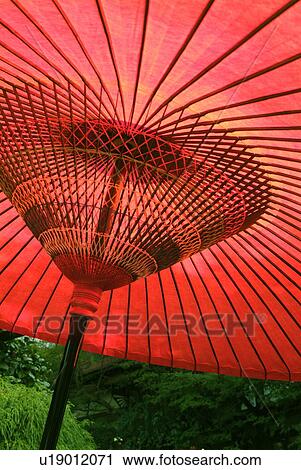 Stock Image - Coarse oilpaper umbrella, close up. Fotosearch