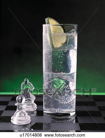 Cocktail on a chessboard View Large Photo Image Stock Photo - Cocktail on a chessboard. Fotosearch