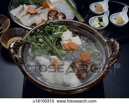 Stock Photography - Cod fish and vegetables cooked in crock pot. Fotosearch