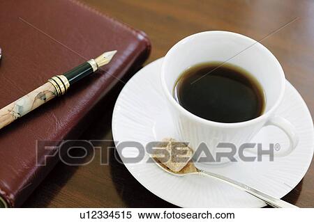 Coffee and a diary View Large Photo Image Stock Photography - Coffee and a diary. Fotosearch