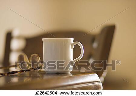Picture - Coffee cup on table. Fotosearch