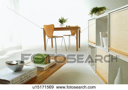 Coffee table with books in house View Large Photo Image Stock Photo - Coffee table with books in house. Fotosearch