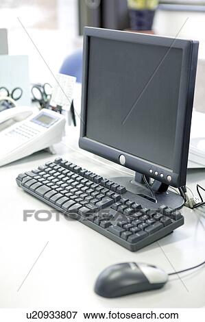 Computer on desk View Large Photo Image Stock Photo - Computer on desk. Fotosearch