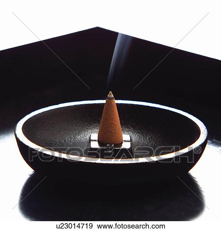 Cone of incense, white background View Large Photo Image Stock Photo - Cone of incense, white background. Fotosearch