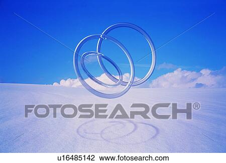 Connected circles hovering over winter landscape View Large Photo Image Stock Image - Connected circles hovering over winter landscape. Fotosearch