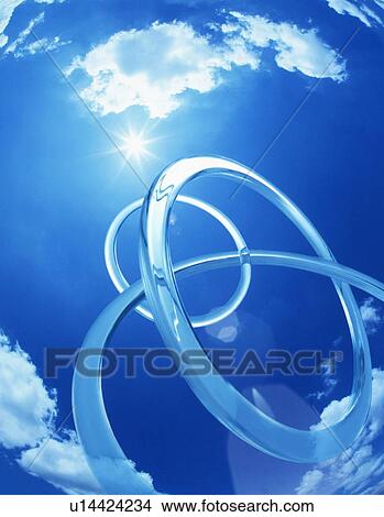 Picture - Connected rings in the sky. Fotosearch