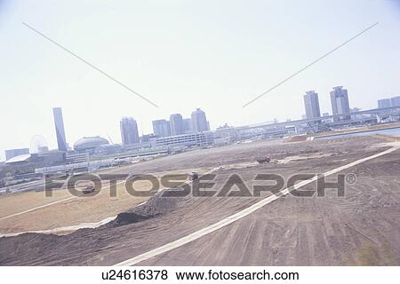 Construction Site with Buildings in the Distance. Koto-ku, Tokyo, Japan View Large Photo Image Stock Photo - Construction Site with Buildings in the Distance. Koto-ku, Tokyo, Japan. Fotosearch