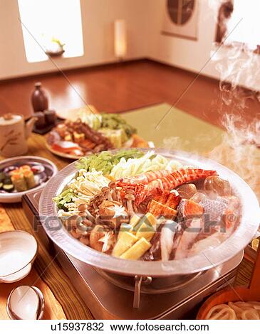 Stock Image - Cooking seafood. Fotosearch