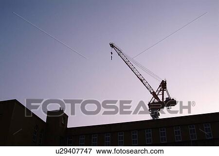 Stock Photo - Crane on building. Fotosearch