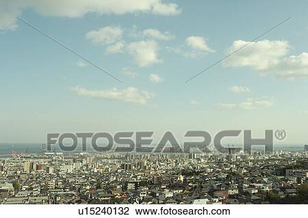 Stock Image - Crowded City and Clear Sky. Fotosearch